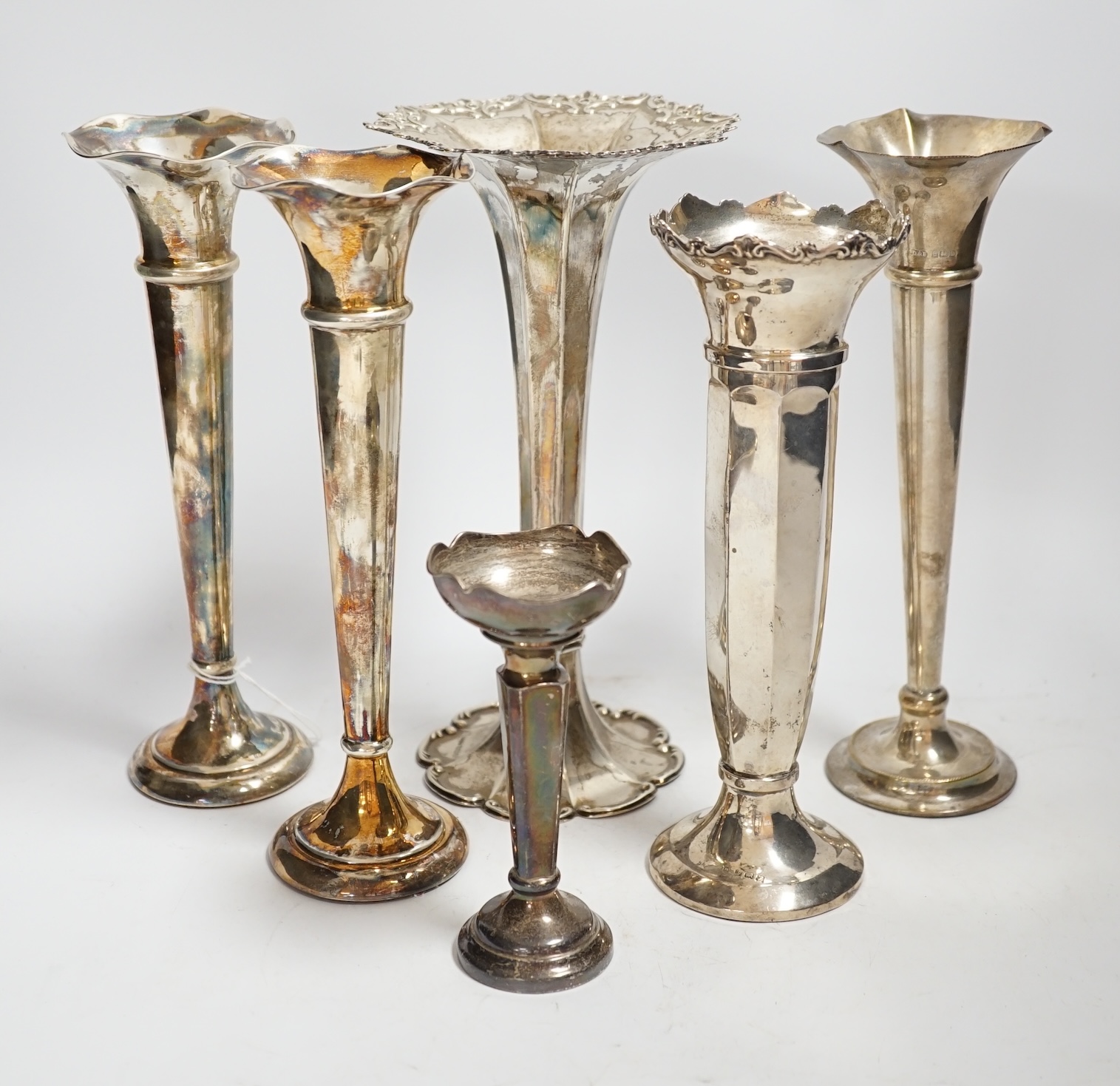 Six assorted early 20th century and later silver mounted specimen vases, including pair by Henry Matthews, Birmingham, 1912, 22.7cm.